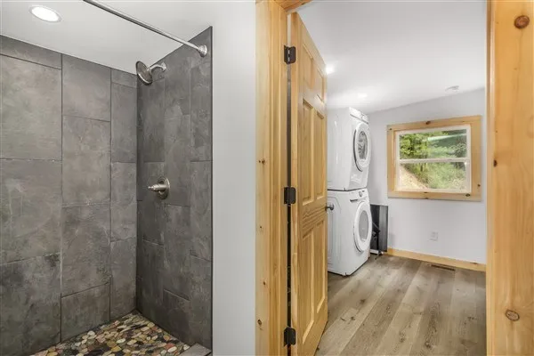 a view of a town with mountains in the background