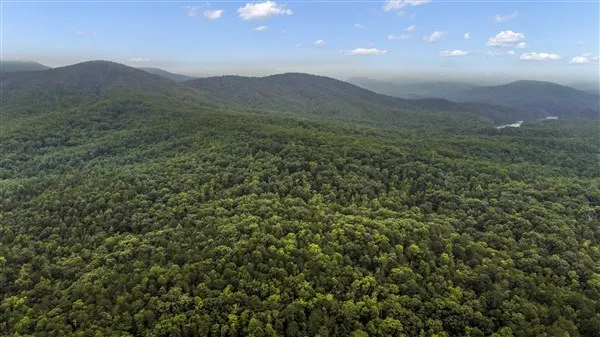 a view of a hallway with washer and dryer