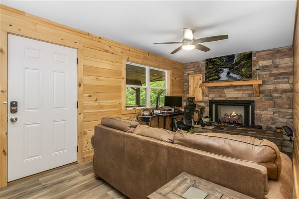 1519 Tipton Springs Road Morganton, GA 30560 - Photo 25 of 46 a living room with furniture and a fireplace