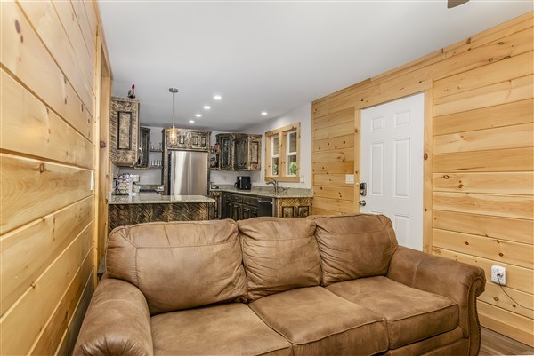 1519 Tipton Springs Road Morganton, GA 30560 - Photo 27 of 46 a living room with furniture and a table