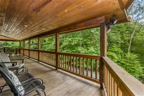 a view of balcony with wooden floor
