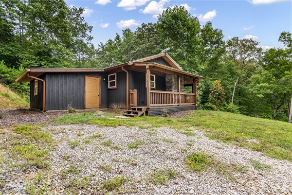 1519 Tipton Springs Road Morganton, GA 30560 - Photo 32 of 46 a front view of house with yard and trees