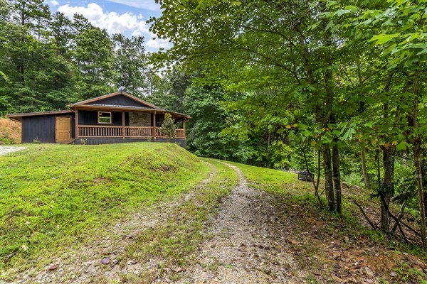 1519 Tipton Springs Road Morganton, GA 30560 - Photo 34 of 46 a view of a backyard with a garden