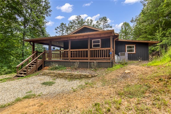 1519 Tipton Springs Road Morganton, GA 30560 - Photo 37 of 46 front view of a house with a yard