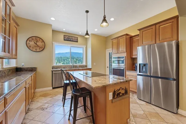 $1,040,000 | 7105 South Saddle Ridge Road, Spokane Valley, WA 99016