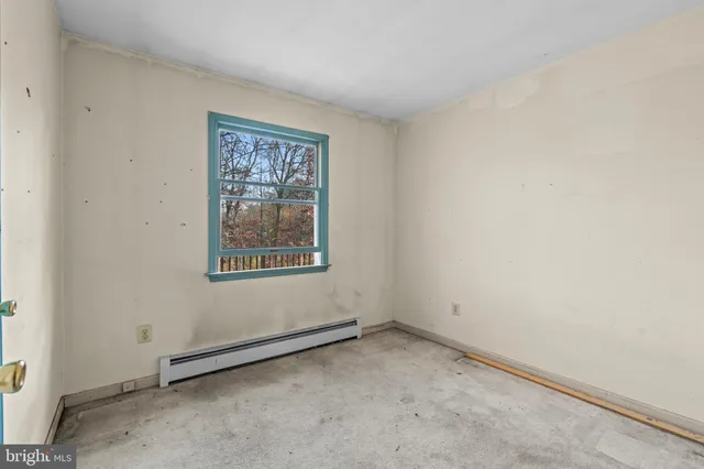 an empty room with a window