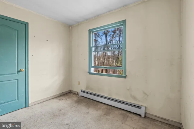 an empty room with windows