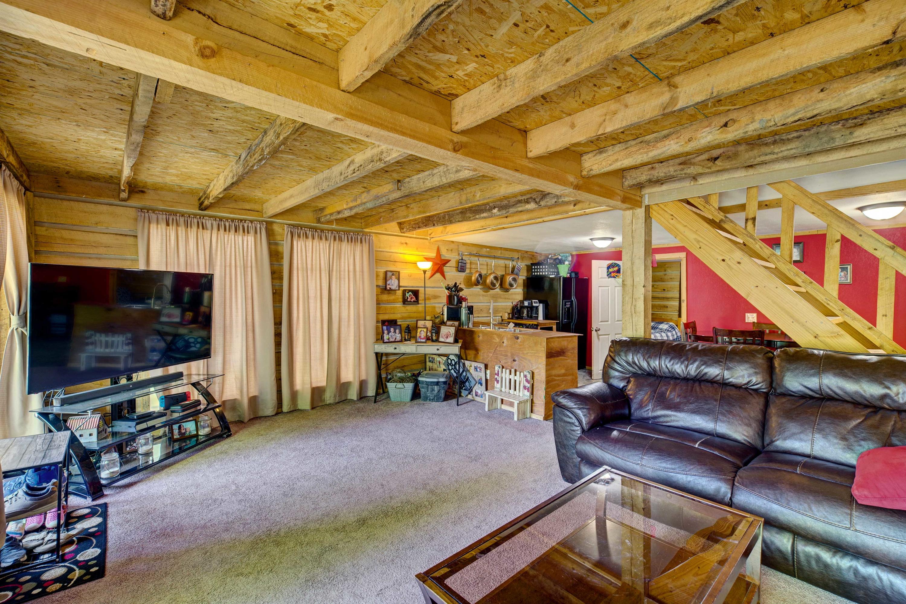 907 Lowes Branch Road La Follette, TN 37766 - Photo 7 of 31 Cabin1_Livingroom4