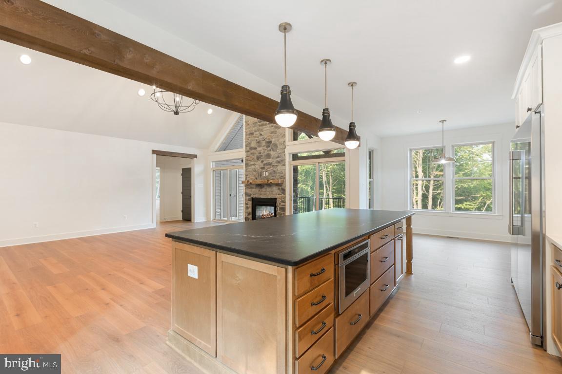 3110 Thurston Road Frederick, MD 21704 - Photo 12 of 38 Upgraded countertops and gorgeous beams.