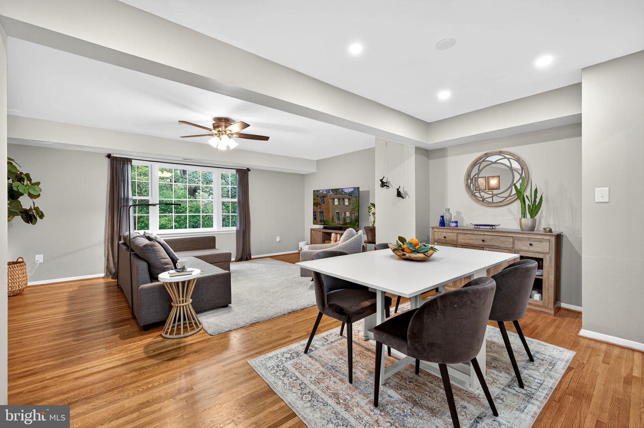 6517 Orono Court Springfield, VA 22152 - Photo 13 of 64 a view of a dining room with furniture window and wooden floor