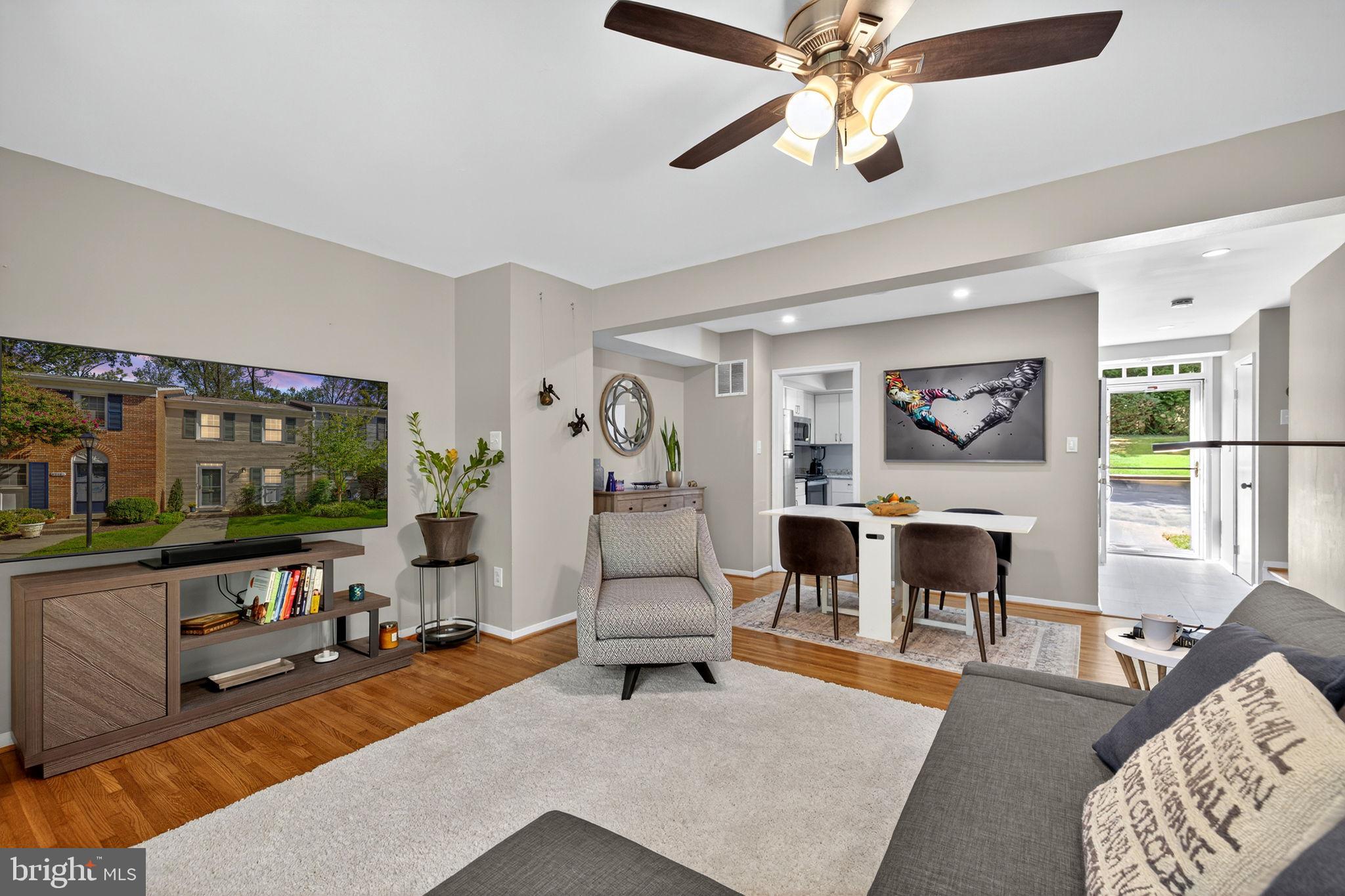 6517 Orono Court Springfield, VA 22152 - Photo 14 of 64 a living room with furniture and a flat screen tv