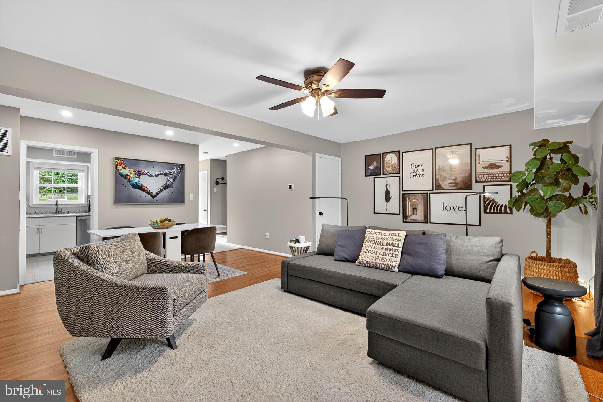 6517 Orono Court Springfield, VA 22152 - Photo 15 of 64 a living room with furniture and a large window