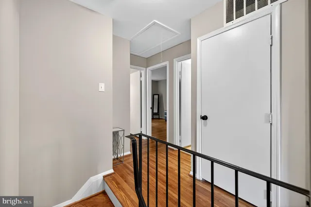 a workspace with furniture and a potted plant