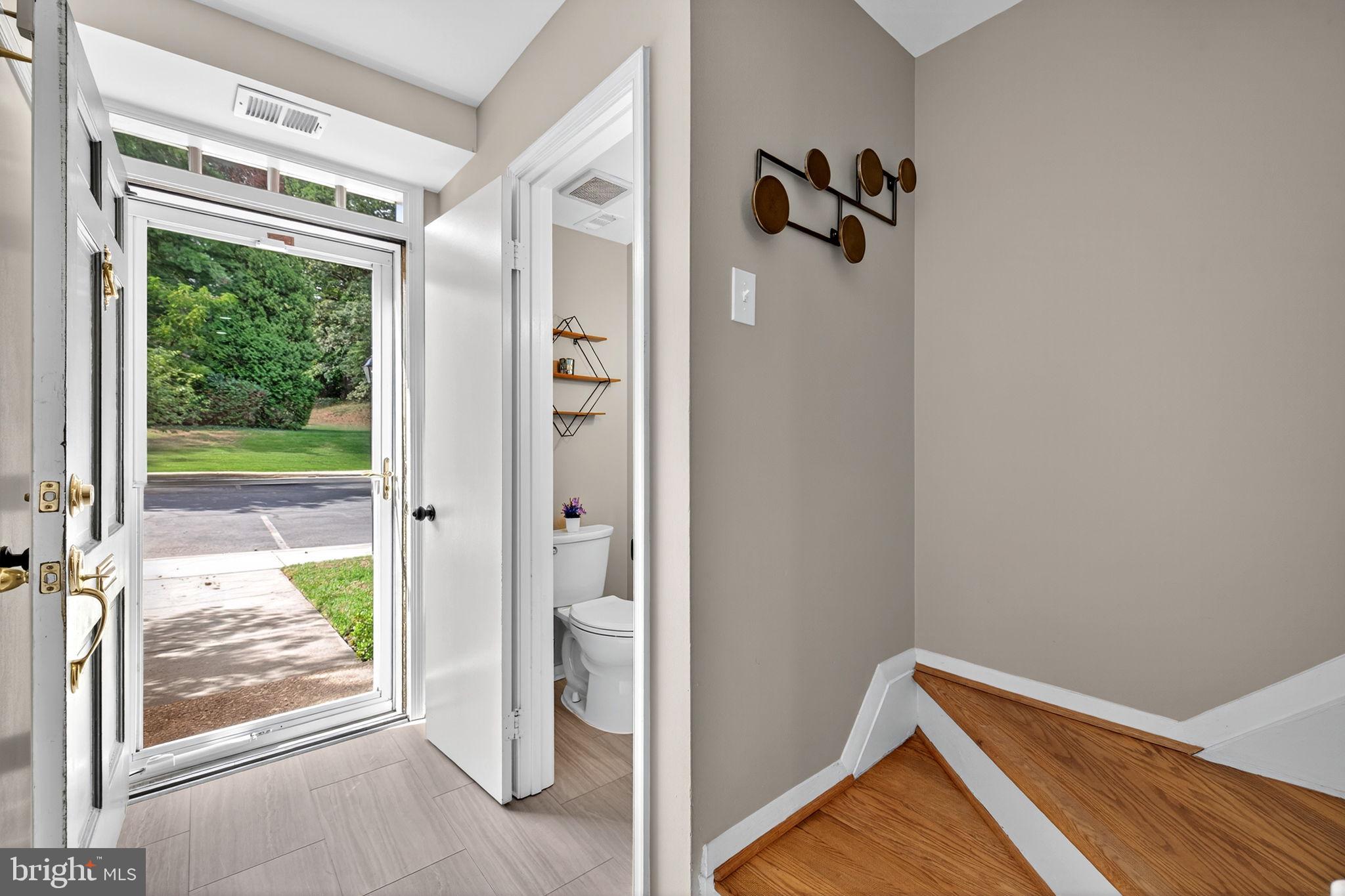 6517 Orono Court Springfield, VA 22152 - Photo 4 of 64 a view of an entryway with wooden floor
