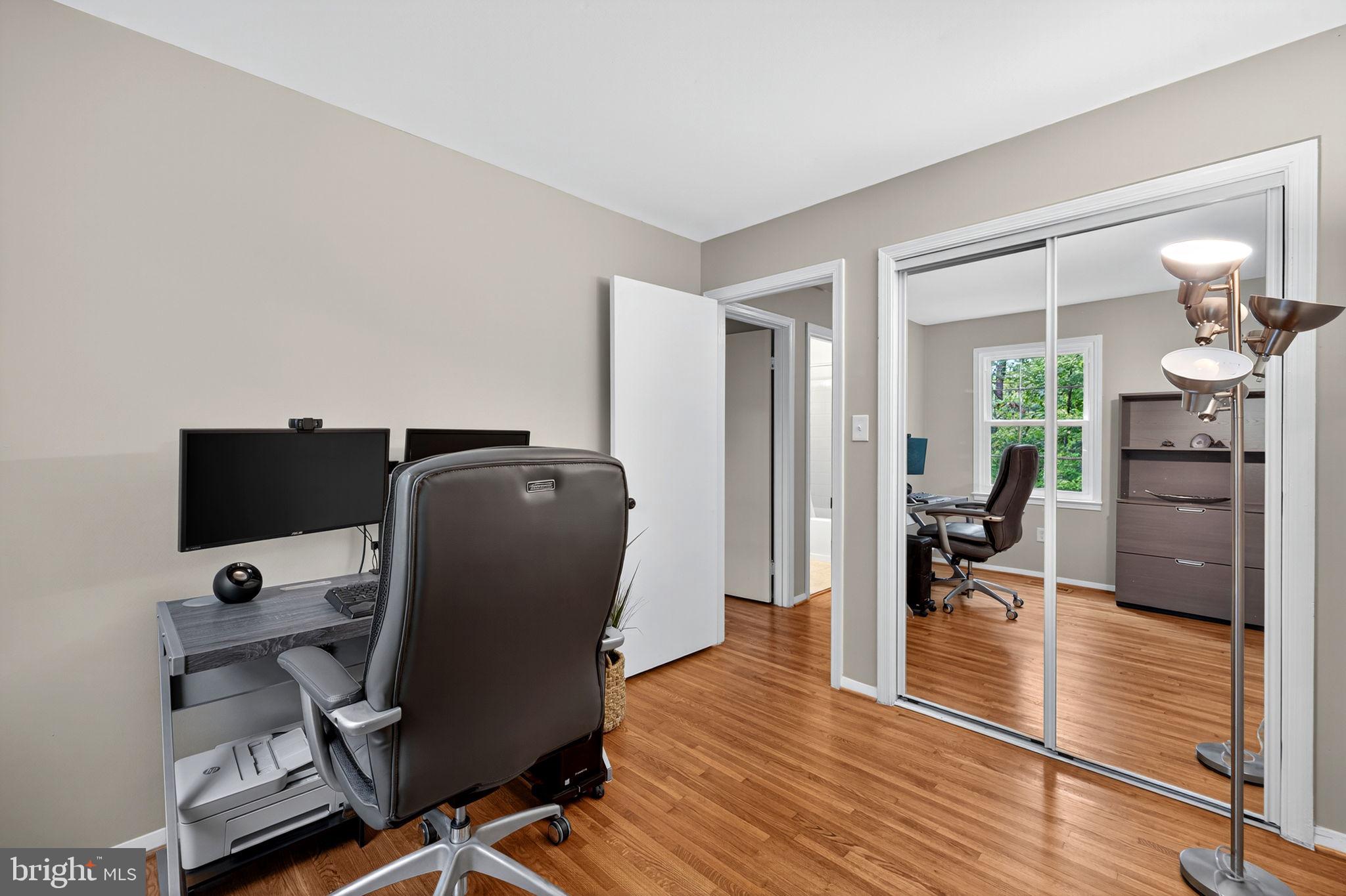 6517 Orono Court Springfield, VA 22152 - Photo 42 of 64 a view of a workspace with furniture and wooden floor