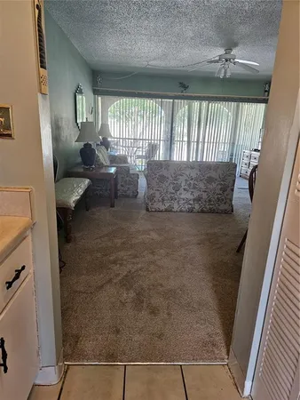a view of a kitchen with a sink