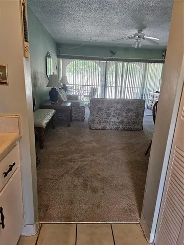 a view of a kitchen with a sink