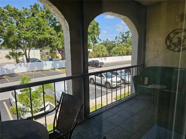 a kitchen with a sink stove and refrigerator