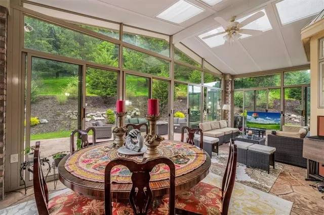 a outdoor dining space with furniture and outdoor view