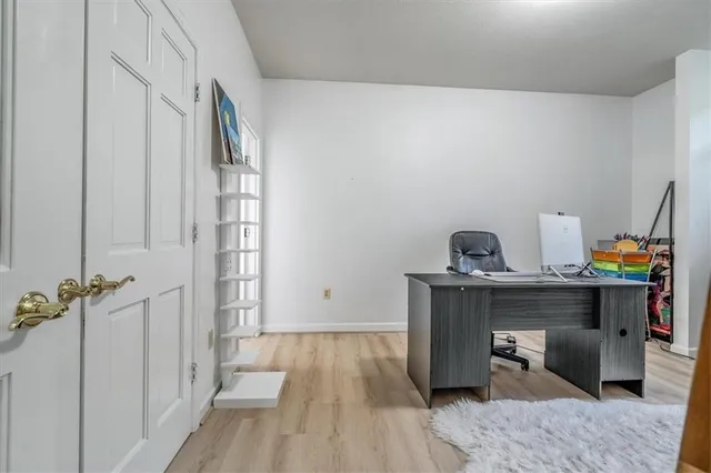 a room with a table and chairs