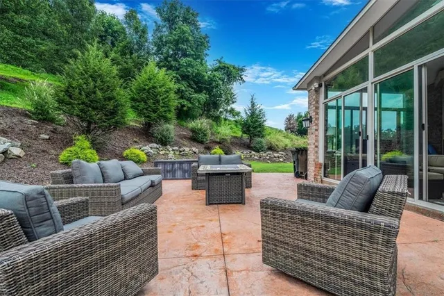 a outdoor living space with furniture and garden