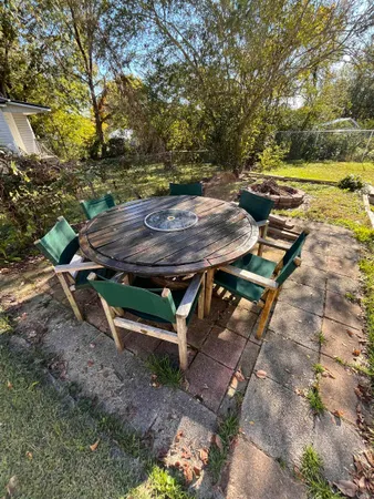 a view of a backyard with wooden floor