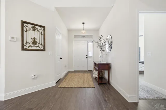 wooden floor in a hall with an entryway
