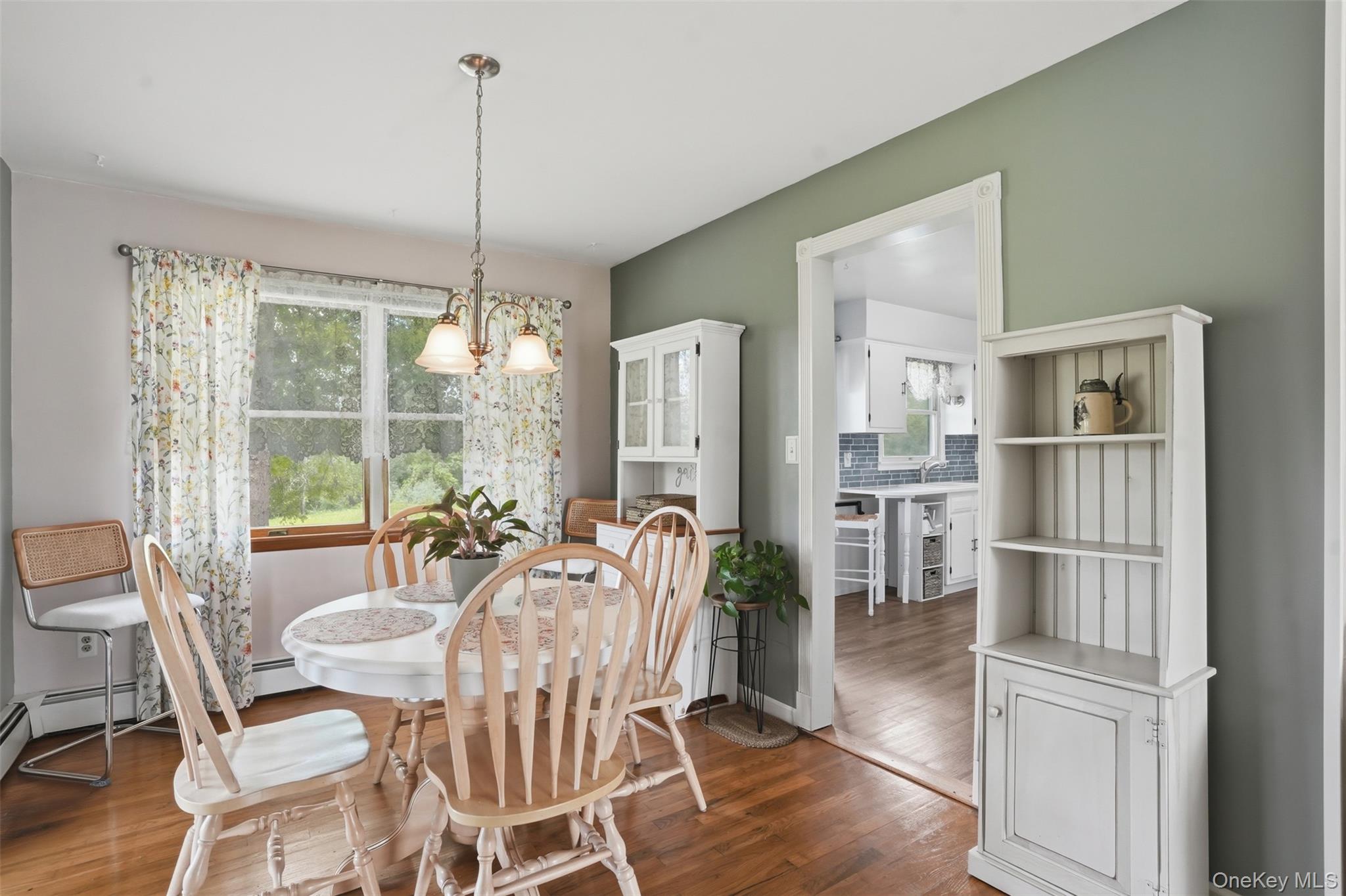 23 Old Cross Road Warwick, NY 10990 - Photo 10 of 34 Casual or formal dining opens to kitchen for ease of serving meals.