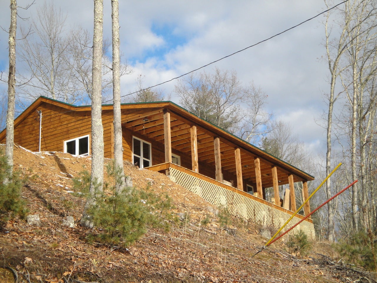 Covered Front Porch & Metal Roof