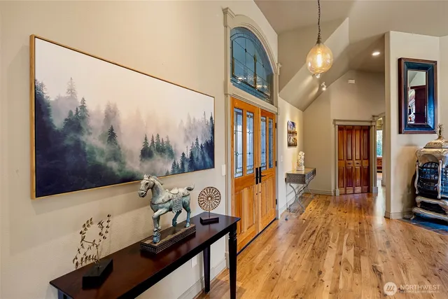 a view of a living room and a flat screen tv
