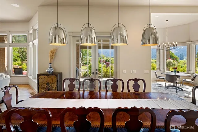 a view of a dining room with furniture window and outside view