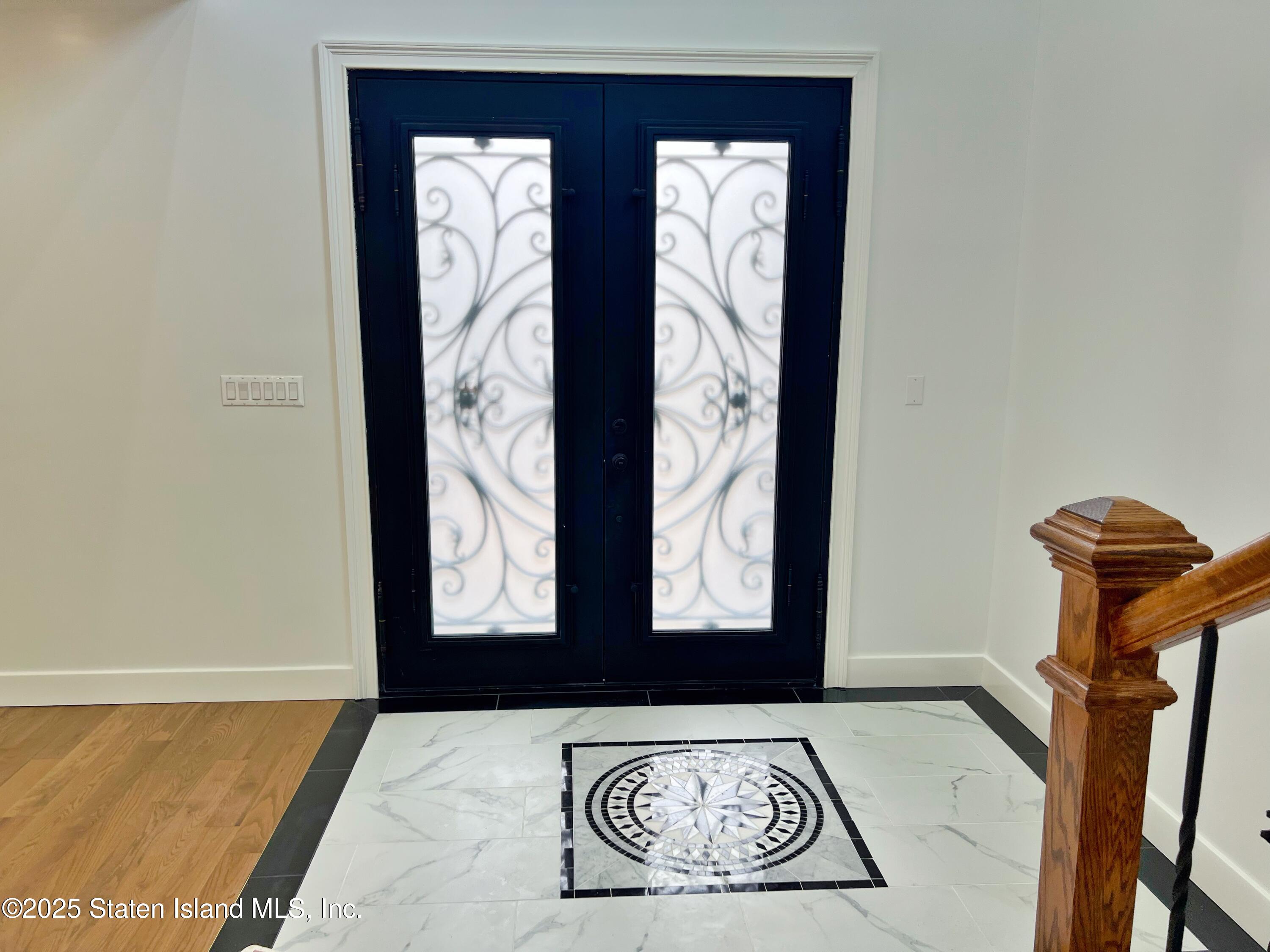 32 Remsen Street Staten Island, NY 10304 - Photo 17 of 41 a view of front door with wooden floor
