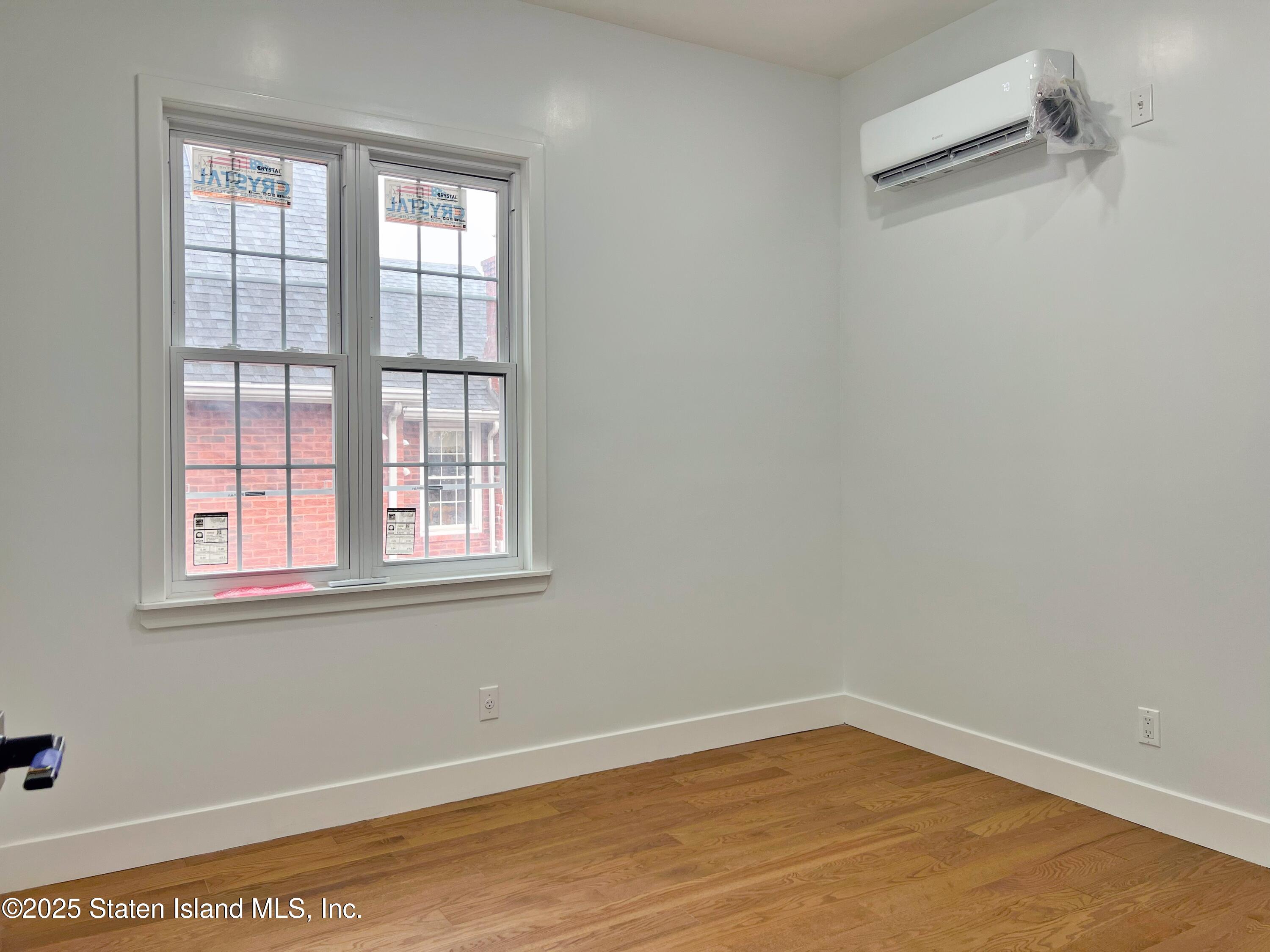 32 Remsen Street Staten Island, NY 10304 - Photo 22 of 41 an empty room with a window
