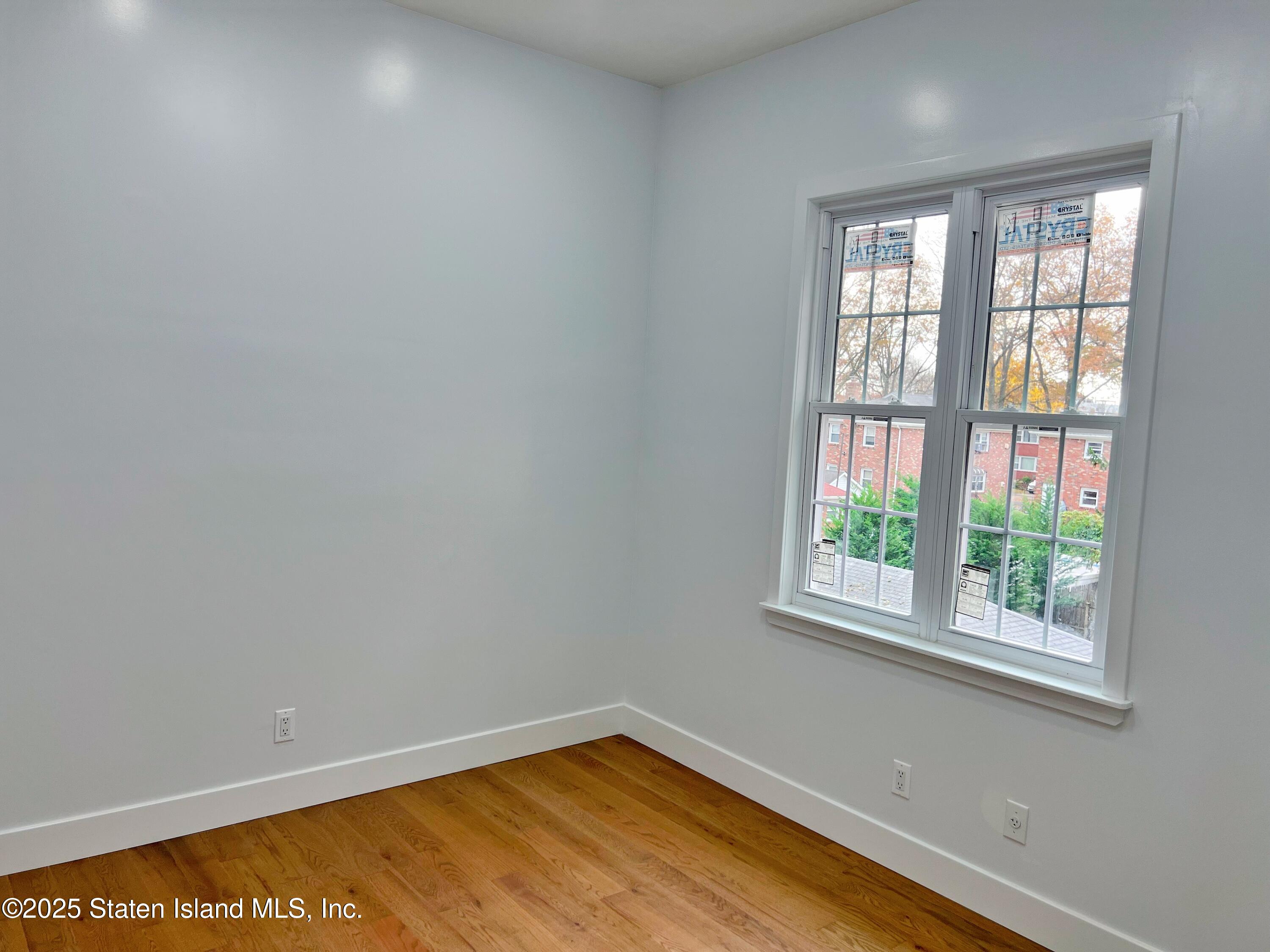 32 Remsen Street Staten Island, NY 10304 - Photo 23 of 41 an empty room with a window