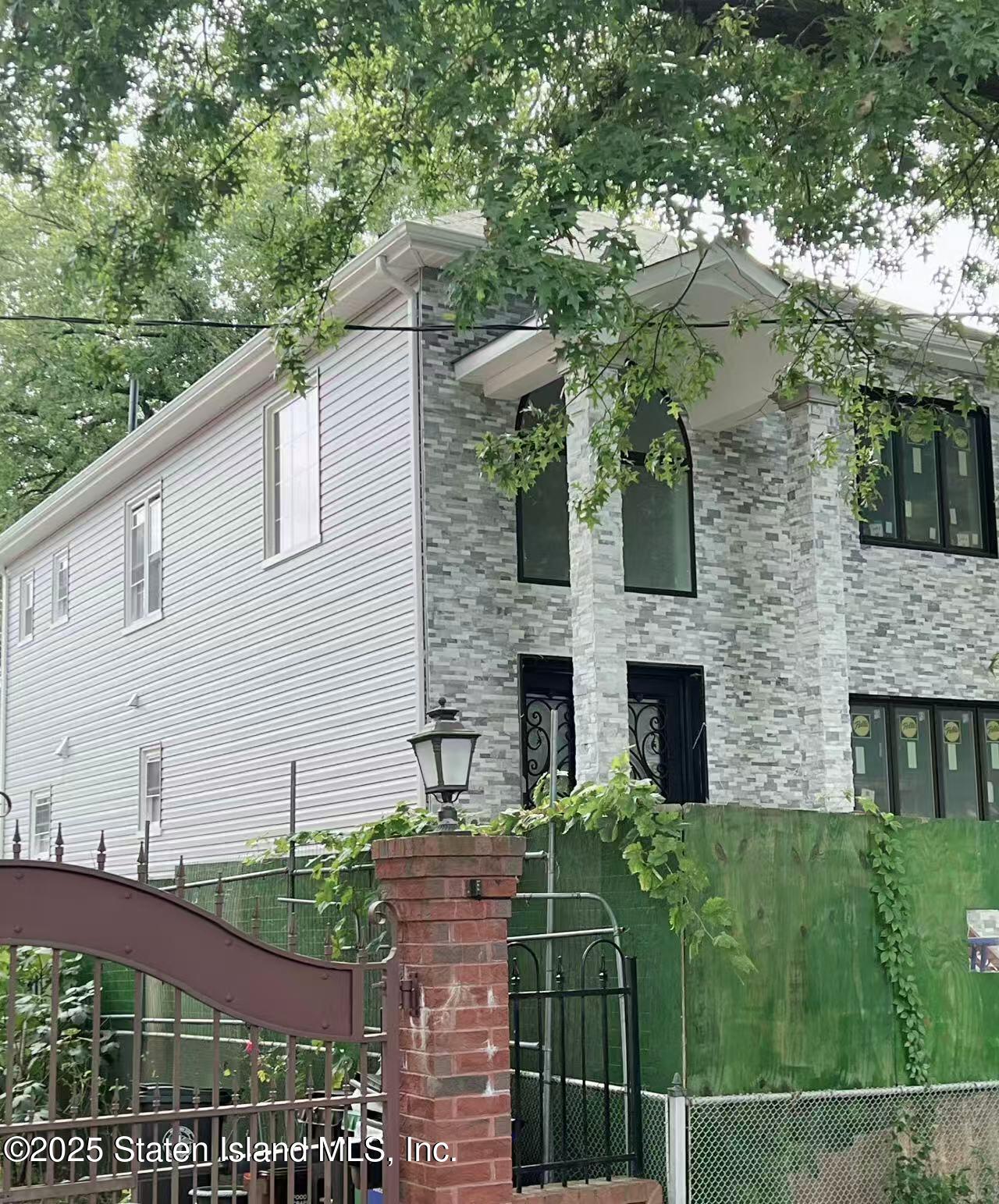 32 Remsen Street Staten Island, NY 10304 - Photo 28 of 41 a view of house with yard