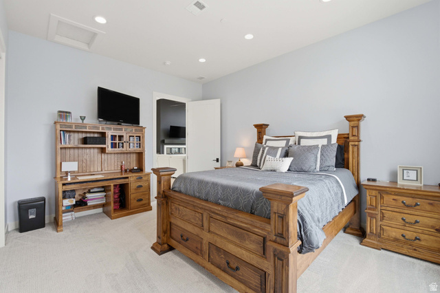 1445 Jacob Road Sandy, UT 84092 - Photo 17 of 52 Recessed lighting, light-colored carpeting, light blue wall paint, and a white door with black hardware