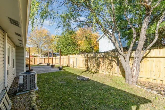a view of backyard with green space