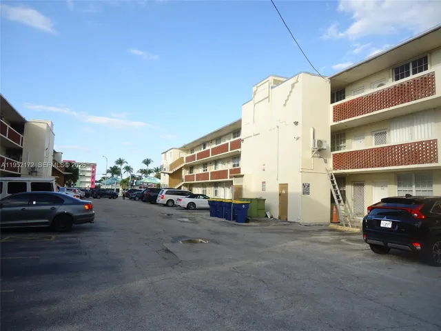 a view of car parked in front of building