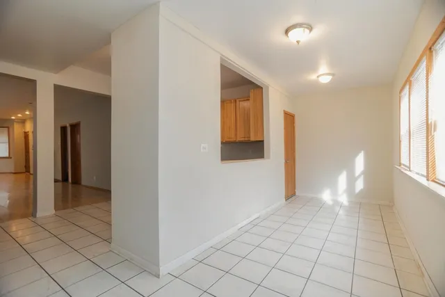 a view of an empty room and window