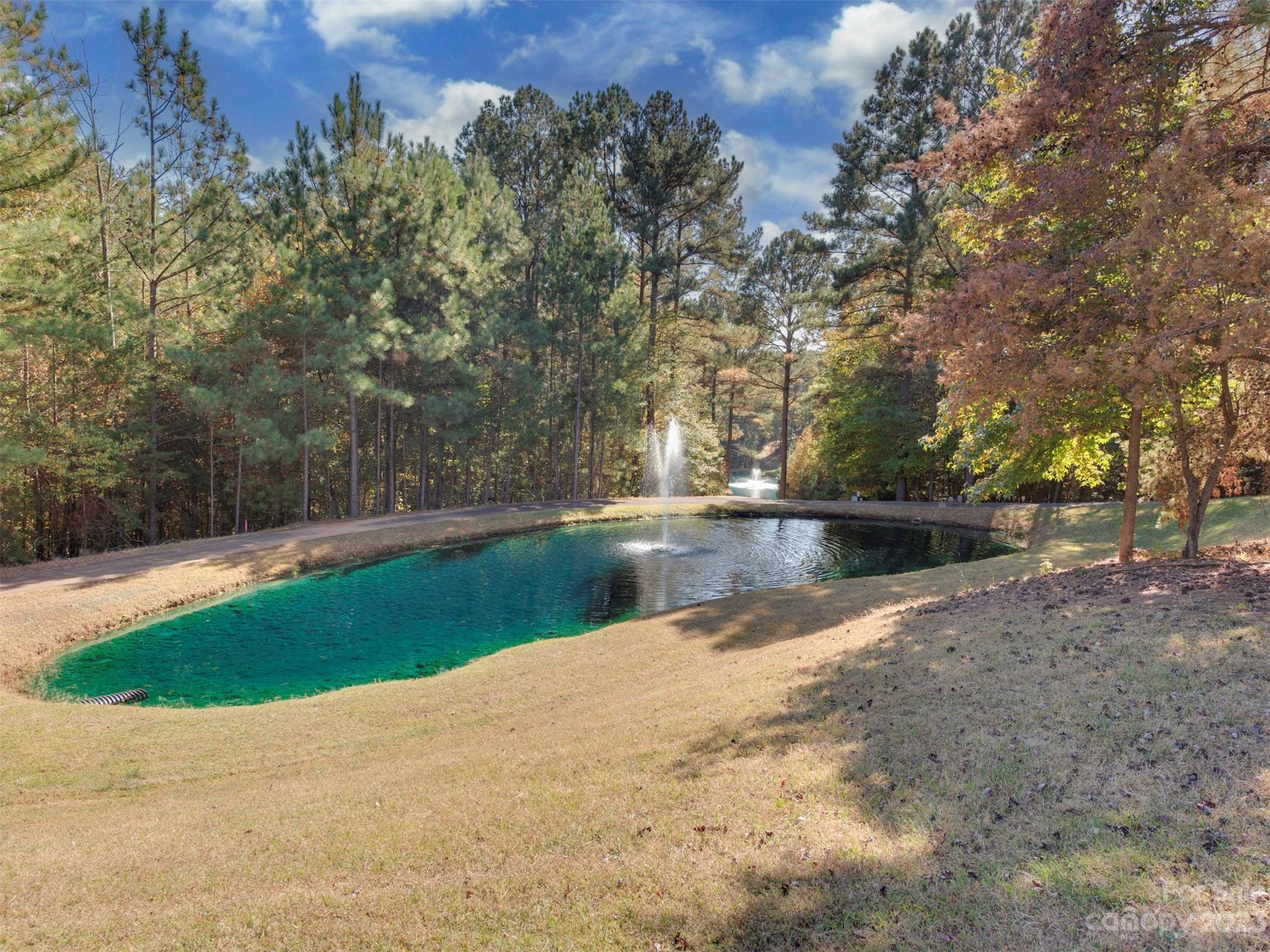 1208 Reflection Pointe Boulevard Belmont, NC 28012 - Photo 8 of 24 a view of lake with a yard