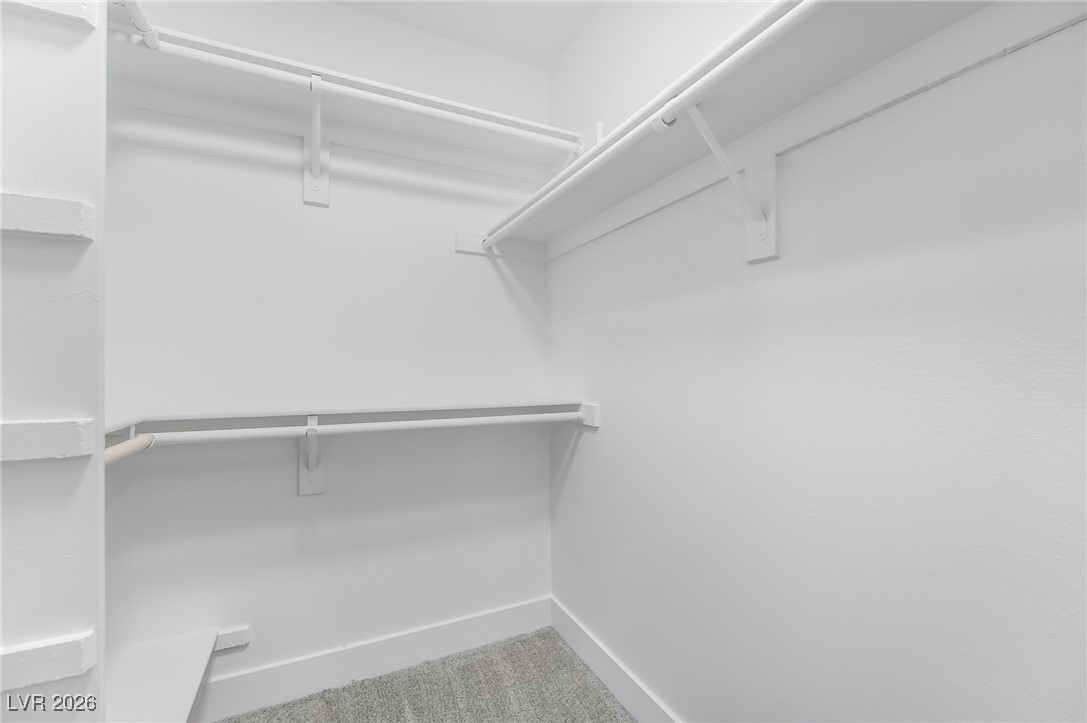 2850 Nikki Place Henderson, NV 89074 - Photo 19 of 64 Walk in closet with light colored carpet