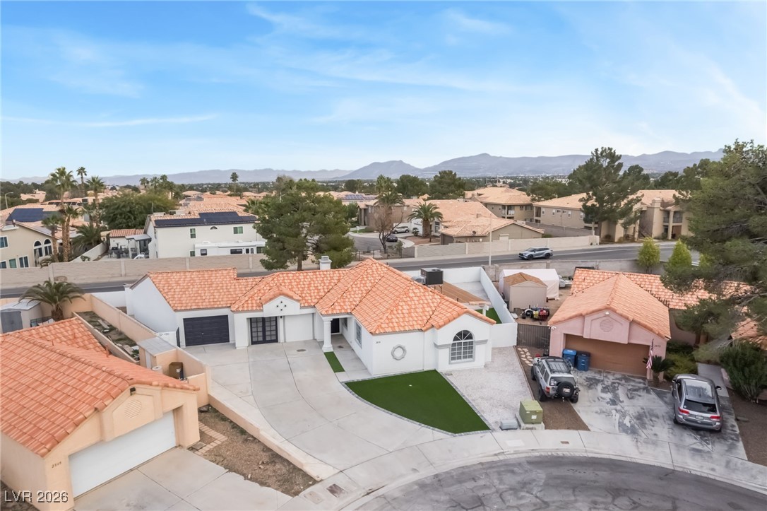 2850 Nikki Place Henderson, NV 89074 - Photo 49 of 64 Aerial view of residential area with mountains