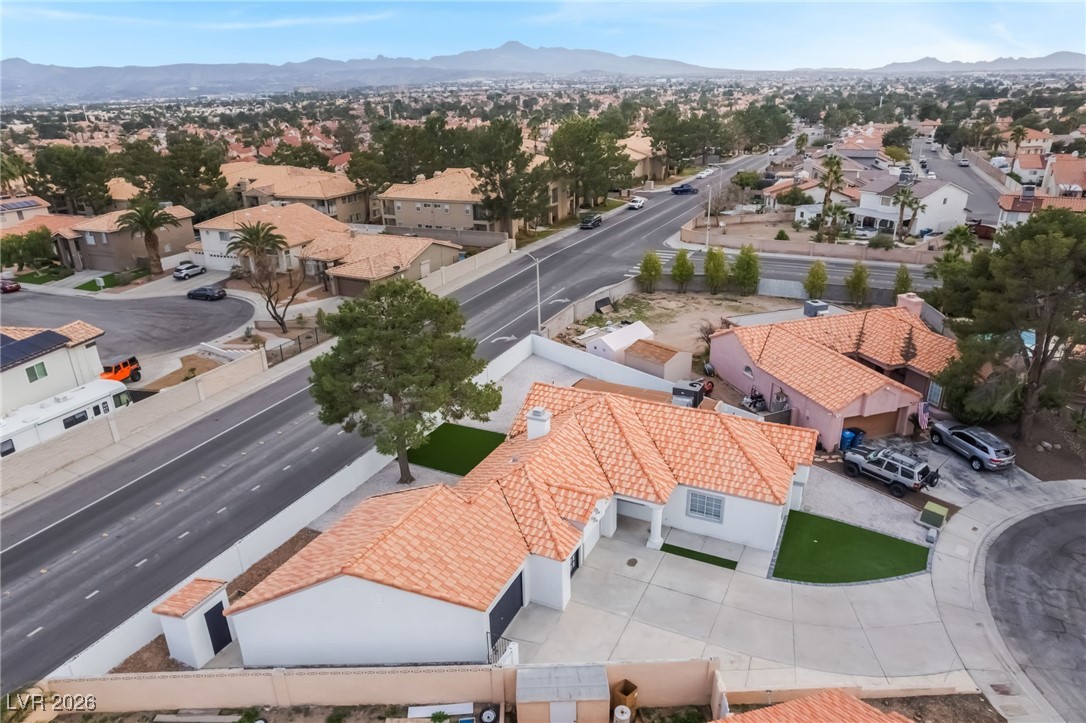 2850 Nikki Place Henderson, NV 89074 - Photo 52 of 64 Aerial view of residential area featuring a mountain backdrop