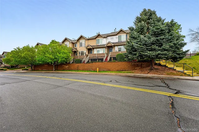 front view of a house with a street