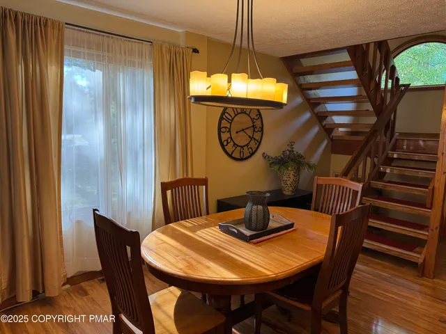 a view of a dining room with furniture