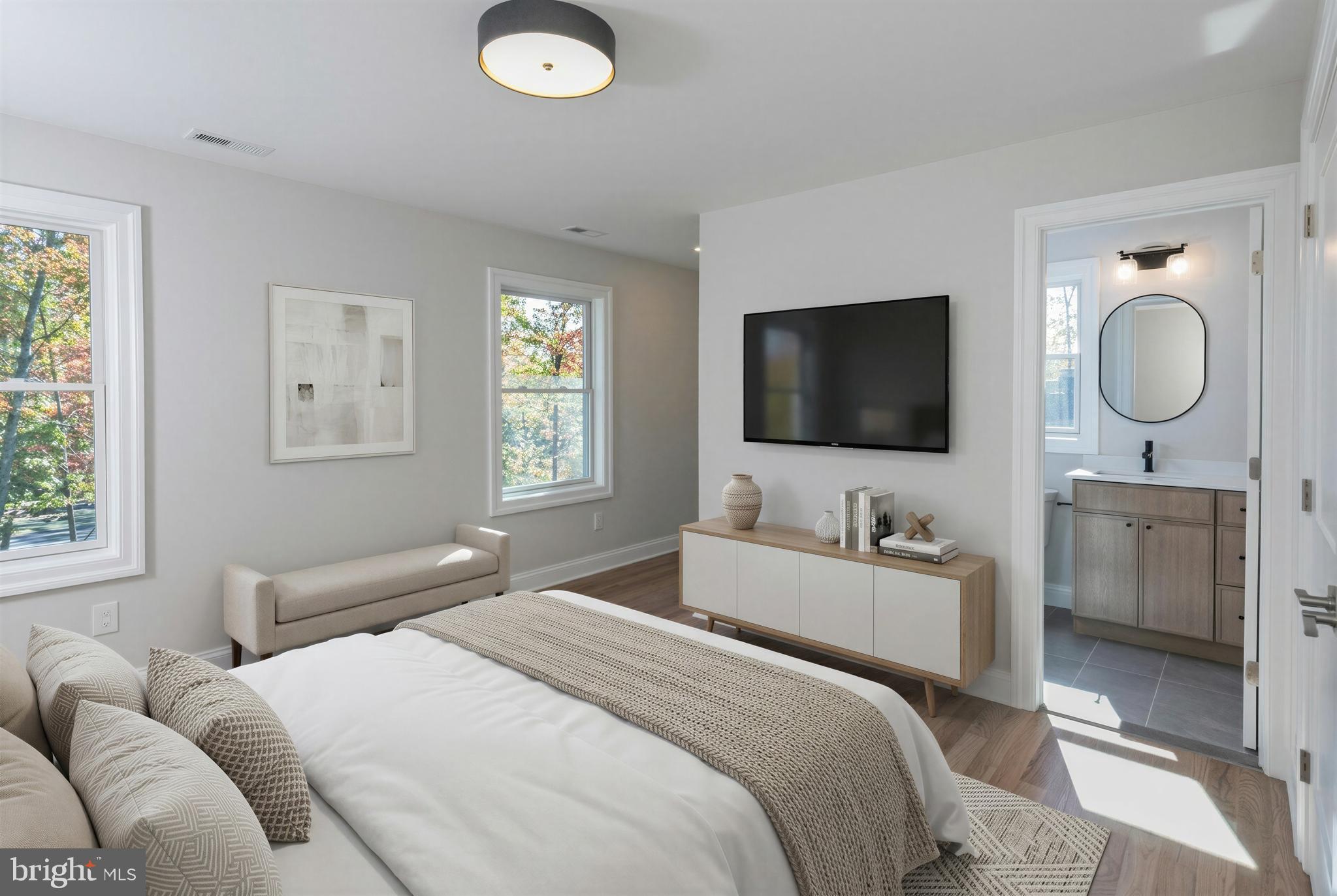 576 Ewing Street Princeton, NJ 08540 - Photo 43 of 61 a bedroom with a bed and a flat screen tv