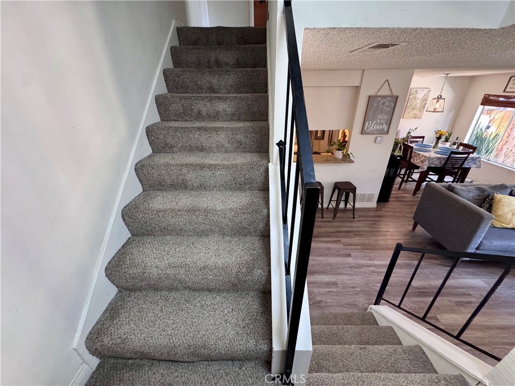 4877 Jackson Street, Unit B Riverside, CA 92503 - Photo 15 of 33 Staircase from the Downstairs Landing