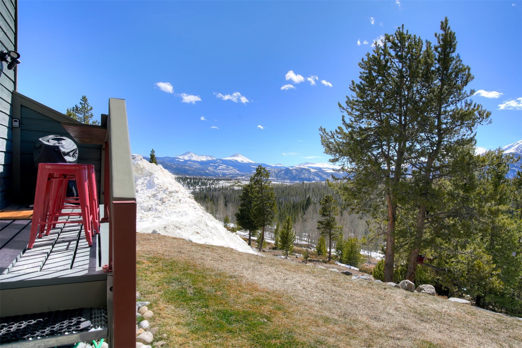 9460 Ryan Gulch Road, Unit 9460 Silverthorne, CO 80498 - Photo 32 of 39 a view of a pathway with a wrought fence