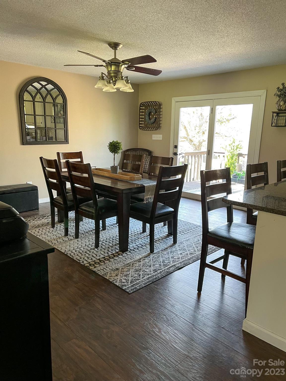 893 Poole Gooden Road Hiddenite, NC 28636 - Photo 33 of 38 a view of a dining room with furniture window and wooden floor