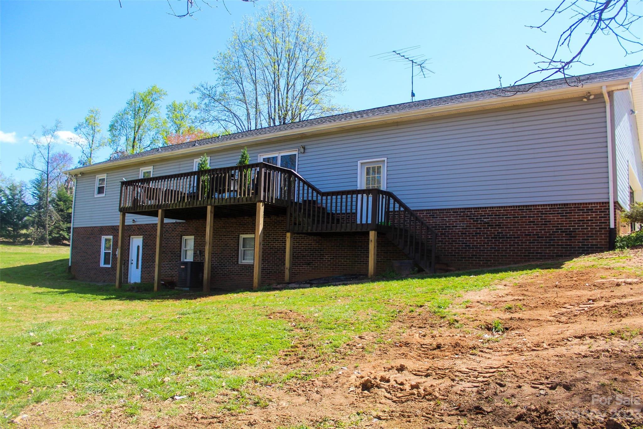 893 Poole Gooden Road Hiddenite, NC 28636 - Photo 6 of 38 a view of a house with a yard